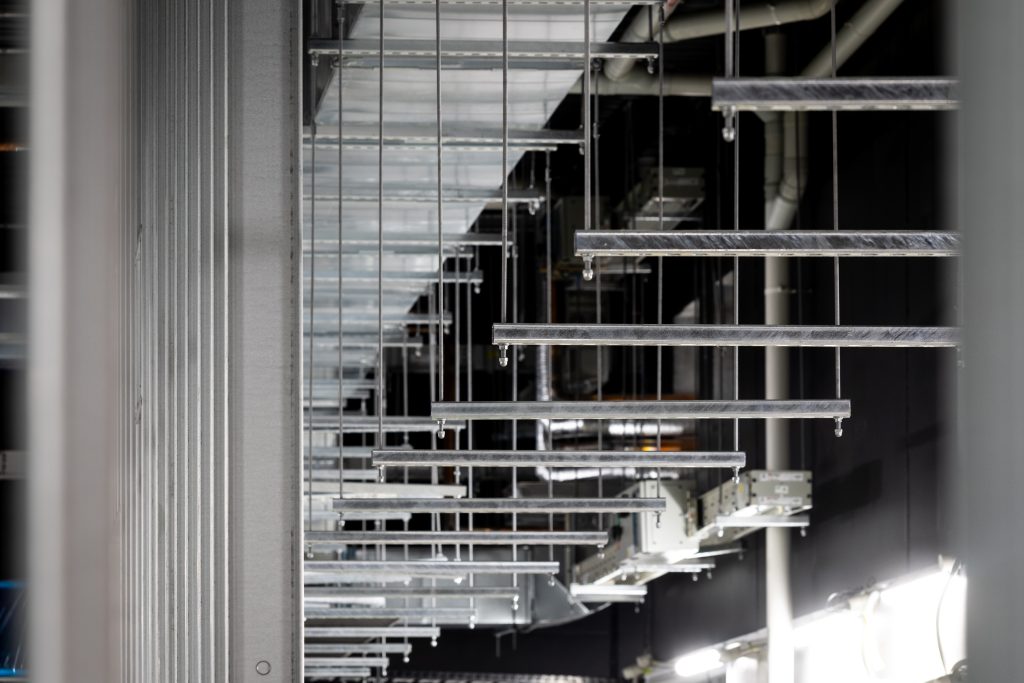 Suspended building-services support framing.